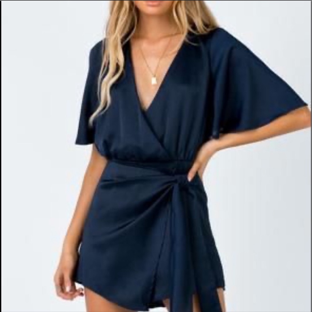 The saved navy tie wrap skort romper